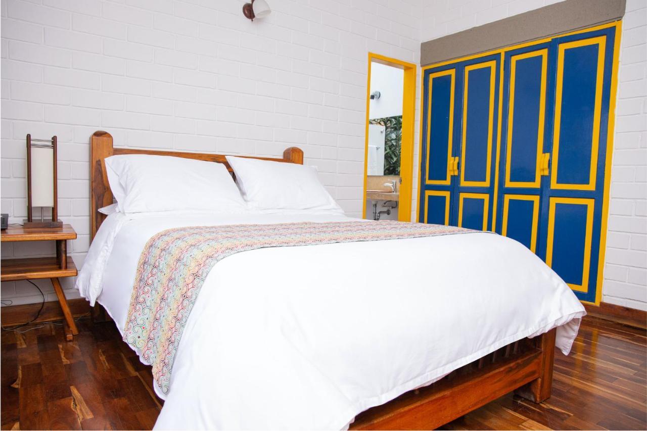 Hotel Termales El Otoño Manizales Exterior foto A bedroom at the hotel