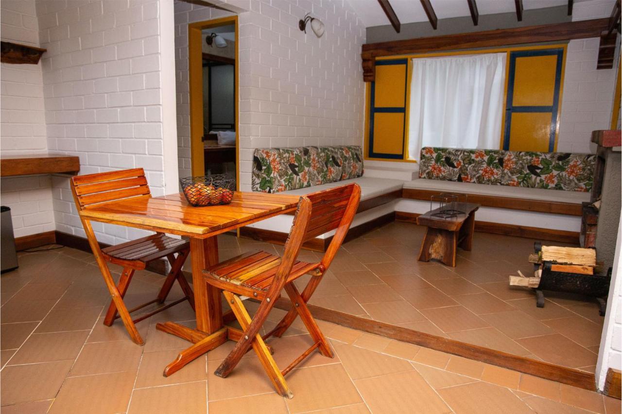 Hotel Termales El Otoño Manizales Exterior foto Interior of a guest room at the hotel